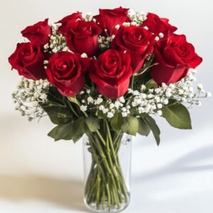 A beautiful arrangement of fresh red roses complemented by delicate baby's breath, elegantly displayed in a clear glass vase, making it a timeless and romantic gift.