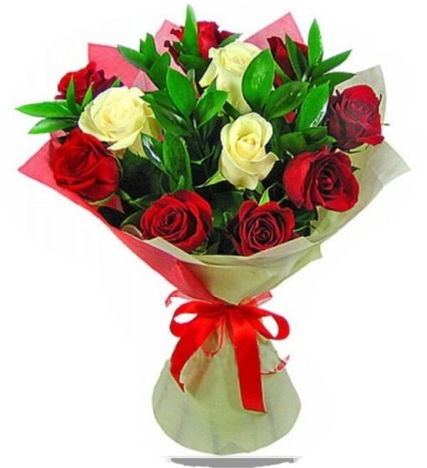 Beautiful bouquet of red and white roses with lush greenery, wrapped in red and white paper with a decorative ribbon